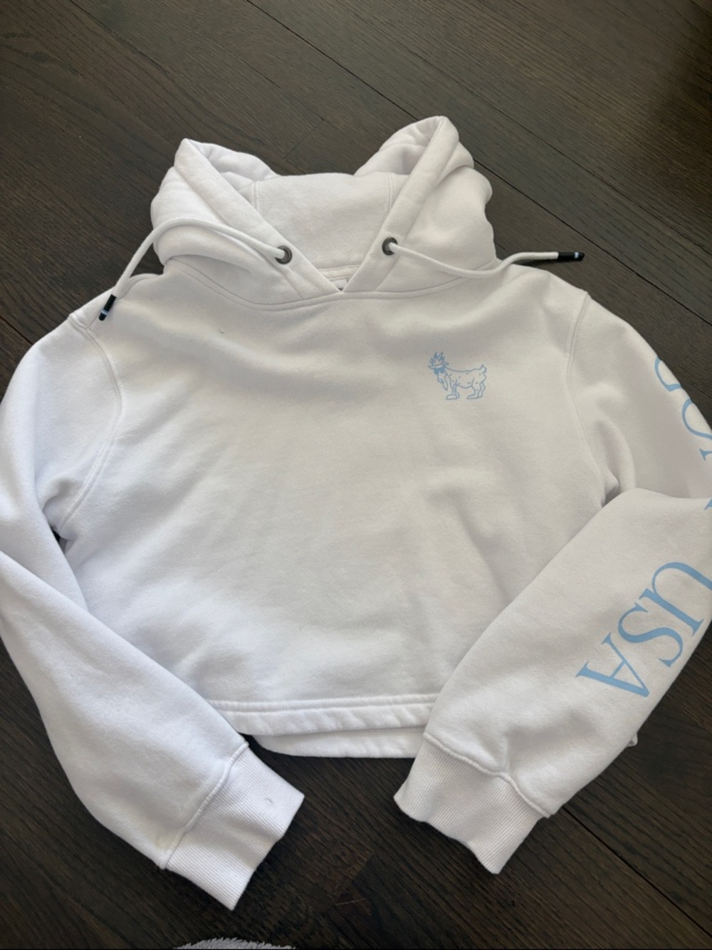 Women's White Cropped Hoodie with Light Blue Logo